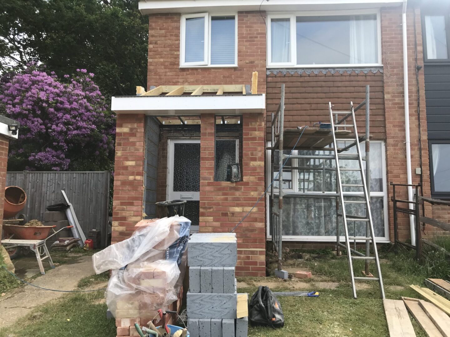 working on home extension work in progress brick